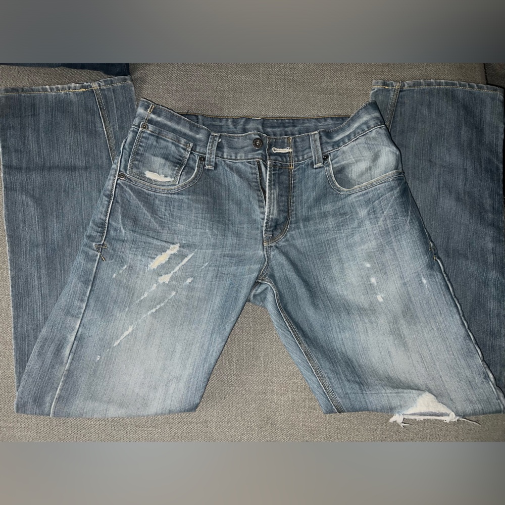 Levi Strauss light wash straight cut ripped jeans